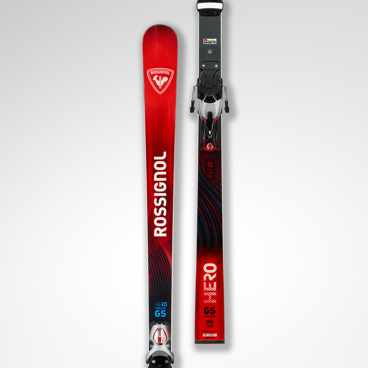Ein Paar Rossignol HERO FIS GS FAC 193 R22 2026/2027 Skier mit Bindungen, aufrecht auf weißem Grund. Auffällige Grafiken und Details unterstreichen das Design der Weltcup-Riesenslalom-Rennski.