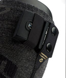 Beheizbare Socke mit Akku – Nahaufnahme der Thermosocke mit integriertem Heizmodul, Power-Button und Druckknopfverschluss. Ideal für Outdoor, Wintersport, kalte Füße und elektrische Fußwärme.