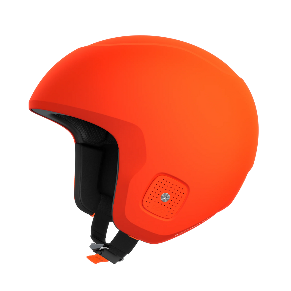 Ein leuchtend orangefarbener POC Sports Poc Skull Dura X Mips Helm mit schwarzer Innenpolsterung, MIPS-Rotationsaufprallschutz und einem verstellbaren Kinnriemen ist im Seitenprofil vor einem schlichten weißen Hintergrund abgebildet.