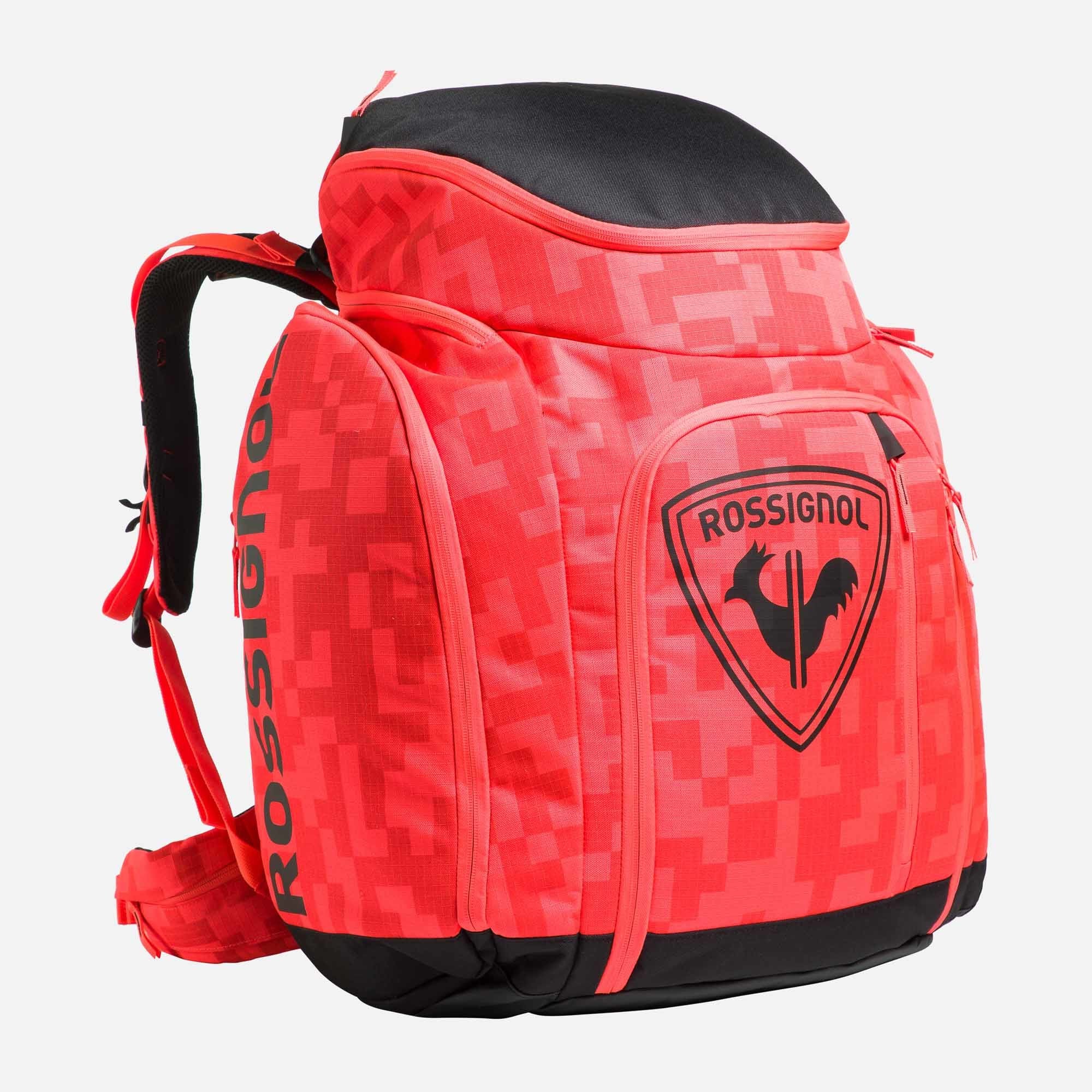 Roter Rossignol-Rucksack mit digitalem Camouflage-Muster, schwarzen Reißverschluss-Akzenten und einem großen Rossignol-Logo mit Hahn auf der Fronttasche.