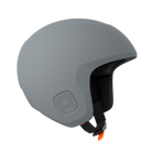 Der POC Sports Poc Skull Dura X Mips ist ein mattgrauer Integralhelm mit schwarzem Innenfutter, Belüftung im Ohrbereich, Kinnriemen mit orangefarbener Schnalle und FIS RH 2013 Zertifizierung.