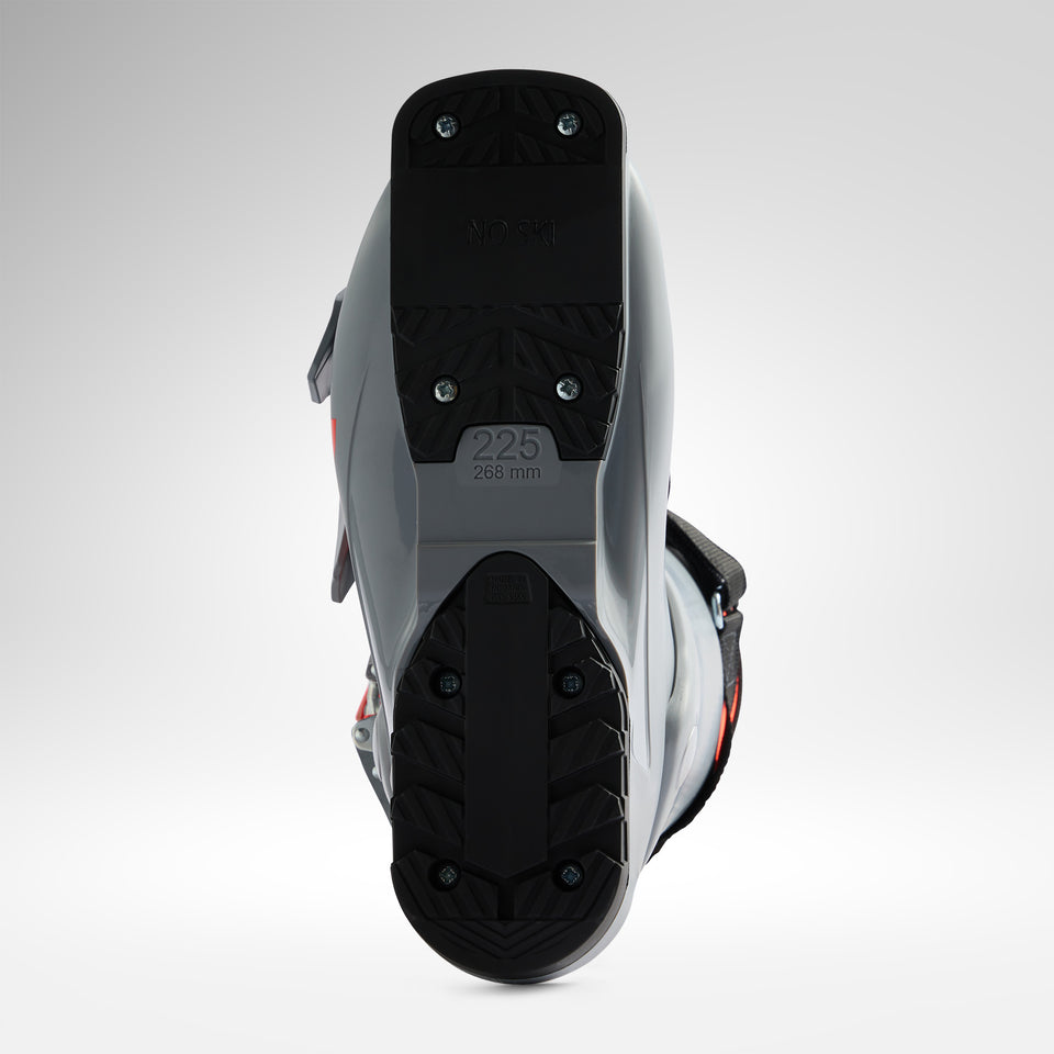 Die Unteransicht eines Rossignol HERO JR 65 - POWER GREY 2026/2027 Junior-Skischuhs zeigt die graue Sohle mit schwarzem Profil, sichtbare Schrauben und die eingeprägte Größenbezeichnung "225 268 mm". Der Hintergrund ist einfarbig weiß. Marke: Rossignol.