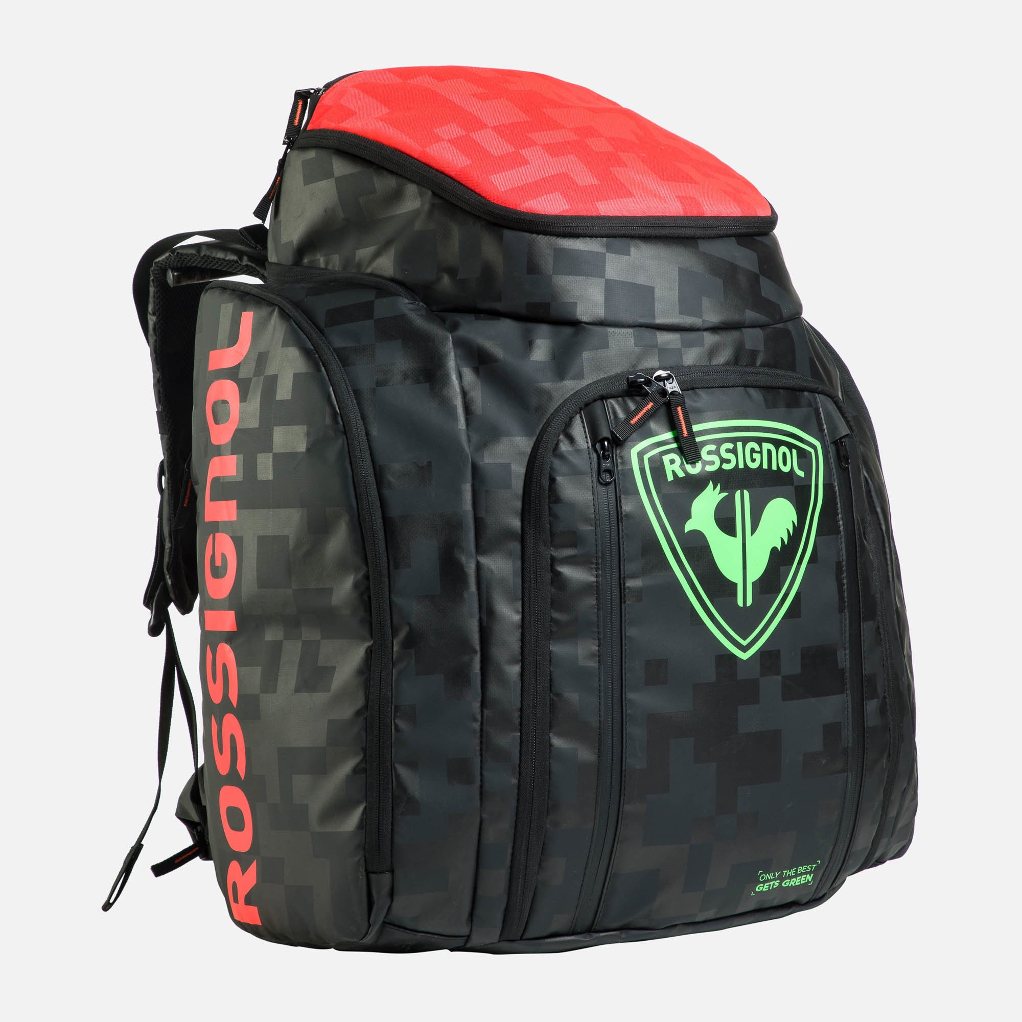 Rossignol Heated Athlete Bag in Schwarz mit gruenem Logo und rotem Deckel, grosser beheizter Rucksack fuer Skischuhe und Ausruestung im alpinen Rennsport.