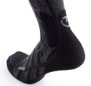 Detailansicht der beheizbaren Skisocke – ergonomisch geformter Fußbereich mit integrierter Heizleitung und Polsterung für optimalen Komfort und Wärme beim Skifahren. Beim Thermic S.E.T. Comfort Ultra warm Heizsocken verläuft das Heizelement seitlich nach unten und umschließt die Zehen und wärmt so von oben und unten den Fuß. 