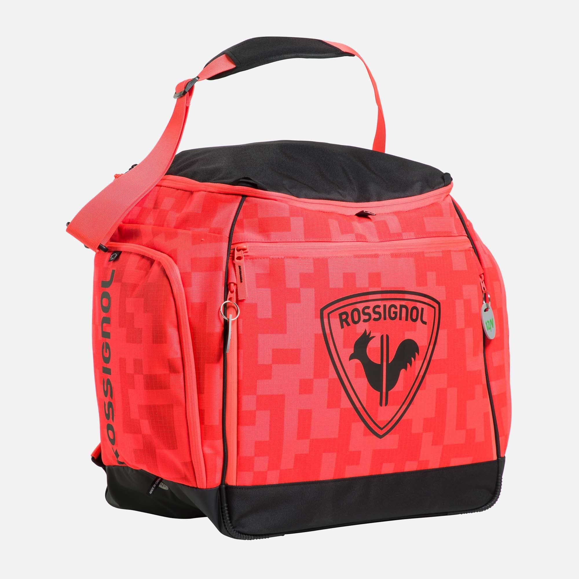 Rossignol Hero Heated Bag 230V – beheizbare Skischuhtasche für Rennläufer mit großem Stauraum, Thermofunktion und robustem Design in Rot-Schwarz.